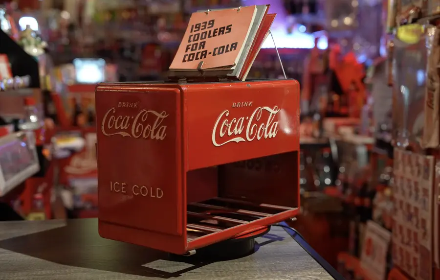 The 1939 Coca-Cola Westinghouse sample cooler with its original "1939 Coolers for Coca-Cola" sales book