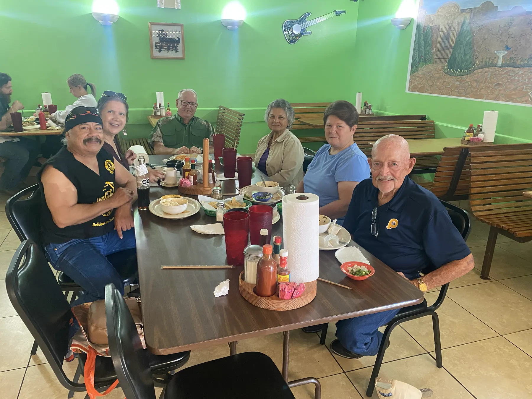 Bardo and Olga Cuellar at lunch with friends, including George and Johnny, who received signed copies of Guinness World Records 2027